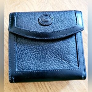 Dooney and Bourke vintage leather unisex wallet.